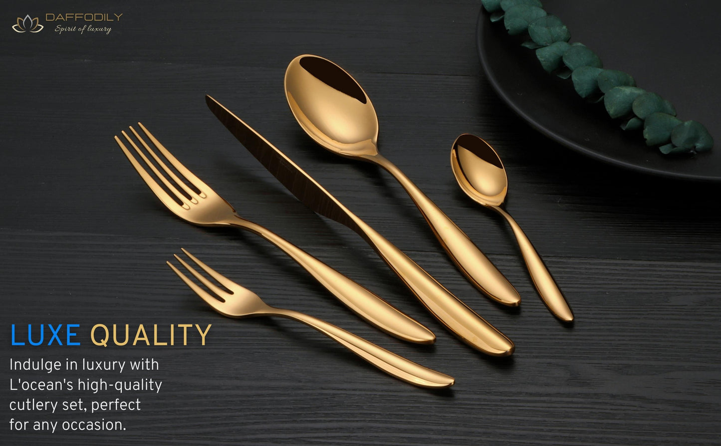 L’océan luxury cutlery set with gold finish on dark slate background, premium fork, knife and spoon