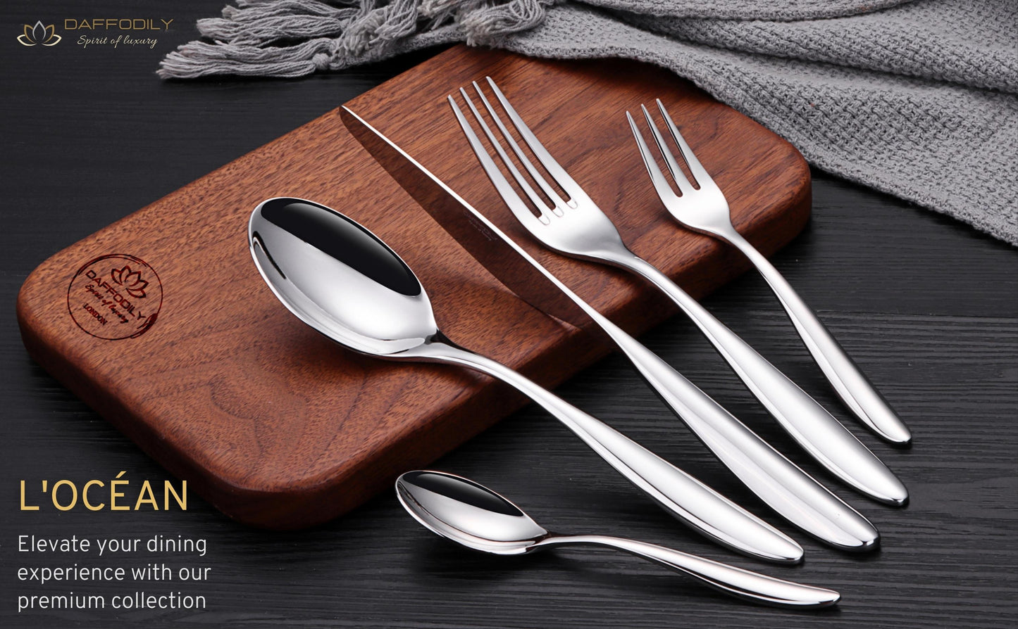 L’océan luxury cutlery set with smooth curves, premium 304 stainless steel silverware on wooden board